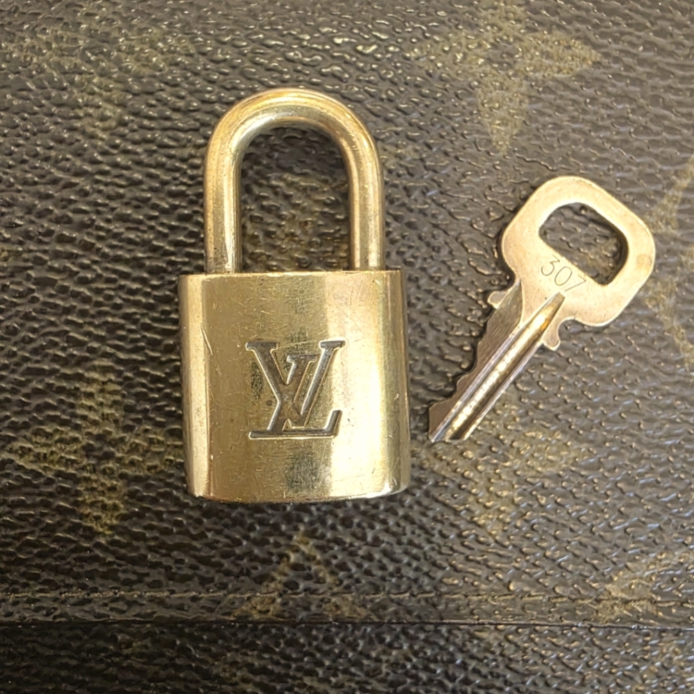 Louis Vuitton Shiny Gold Padlock and Key Set